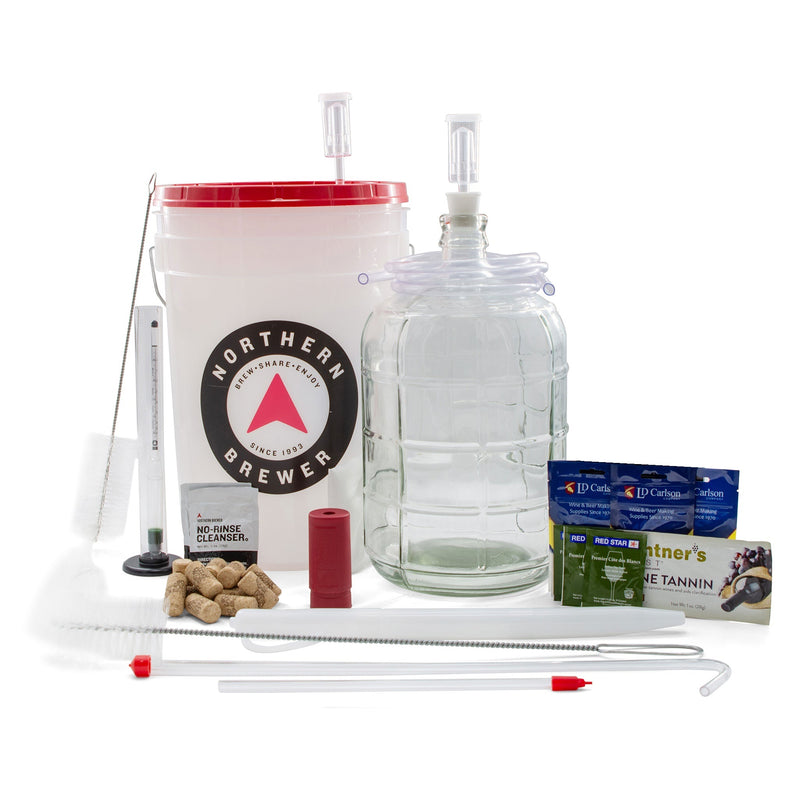 Complete 3-gallon fruit winemaking equipment setup from Master Vintner, featuring a 6.5-gallon fermenting bucket, 3-gallon glass carboy, winemaking ingredients, siphoning tools, corks, brushes, and airlocks—perfect for small-batch home wine fermentation.