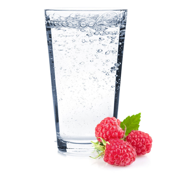 A glass of Raspberry Hard Seltzer with raspberries.