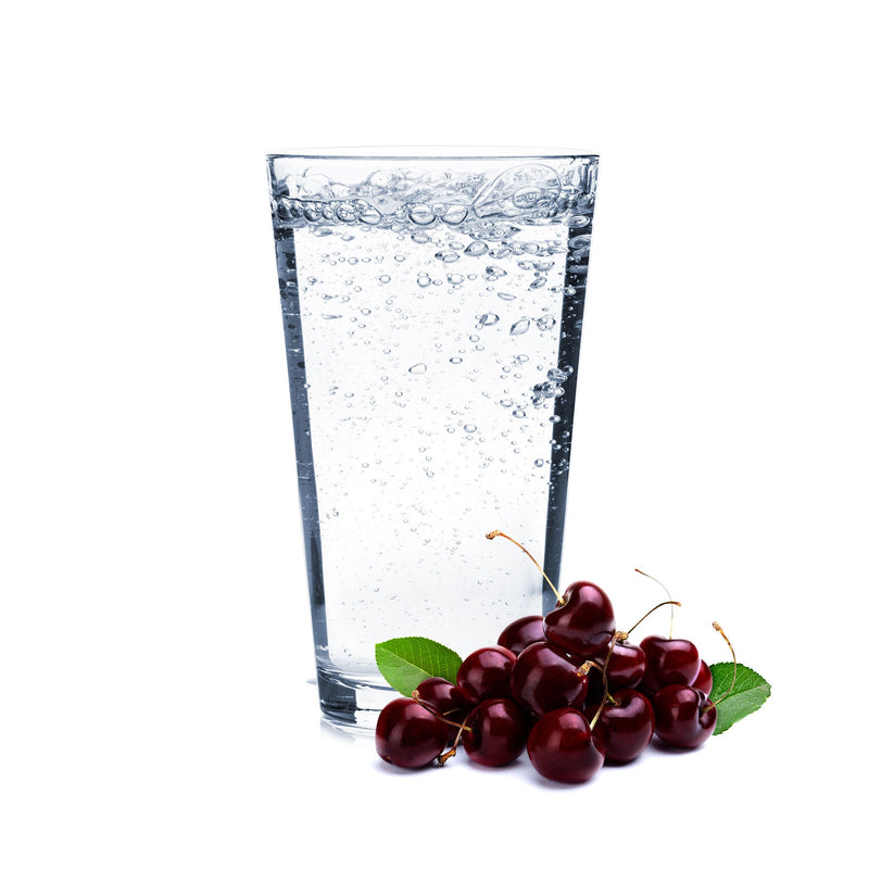 A glass of Black Cherry Hard Seltzer with cherries.