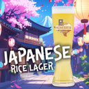 Glass of Japanese rice lager on a wooden surface with 'Austin Homebrew Supply' logo.