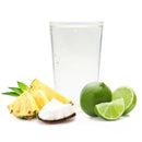 Tropical piña colada Ranch Water with pineapple wedges, coconut, and whole lime next to glass.