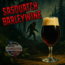 Glass of dark beer with Sasquatch Barleywine text and Austin Homebrew Supply logo in a forest setting.