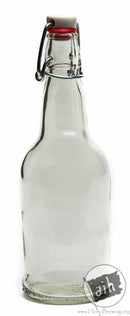 A single 16 oz. clear E.Z. Cap Swing Top Beer Bottle