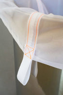 Close-up of a brew bag with orange stitching inside a brew kettle